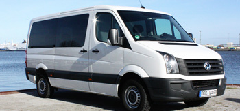 9-seater VW Crafter schoolbus from JOYRIDE in front of the port in Rostock