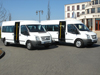 14-Sitzer Ford Transit side view with sliding door